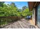 Exterior wooden deck features patio seating and a serene wooded view, ideal for outdoor relaxation at 3611 Winfair Pl, Marietta, GA 30062