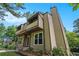 Angled exterior of a home showing front door, porch and second-story balconies at 3611 Winfair Pl, Marietta, GA 30062