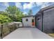 Backyard featuring a privacy fence, rear entrance, and dark brick and light siding at 851 Flagler Se Cir, Smyrna, GA 30080
