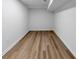 Unfinished basement featuring new flooring and white trim at 851 Flagler Se Cir, Smyrna, GA 30080