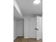 Basement featuring new flooring, white walls, and crisp white doors at 851 Flagler Se Cir, Smyrna, GA 30080