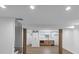 Finished basement featuring updated lighting, an accent wall, a staircase, and a partially-hidden kitchenette at 851 Flagler Se Cir, Smyrna, GA 30080
