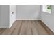 This bedroom features natural light, modern floors, and crisp white walls, creating a clean and bright atmosphere at 851 Flagler Se Cir, Smyrna, GA 30080