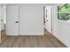 Freshly painted bedroom featuring hard wood floors, neutral walls, a window, and white trim at 851 Flagler Se Cir, Smyrna, GA 30080
