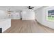 Spacious open-concept living area featuring hardwood floors, sliding barn doors, and abundant natural light at 851 Flagler Se Cir, Smyrna, GA 30080