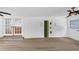 Bright living room with white brick walls, modern lighting, and hardwood floors create a sleek, modern living space at 851 Flagler Se Cir, Smyrna, GA 30080