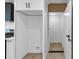 Bright open pantry features white shelving, adjacent to the kitchen and an external doorway at 851 Flagler Se Cir, Smyrna, GA 30080
