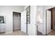 Bedroom features a closet, decor and doorway leading to the kitchen with modern appliances at 12071 Conrad Cir, Hampton, GA 30228