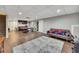 Large finished basement with kitchenette, entertainment area, and walkout access at 131 Banyon Ct, Dallas, GA 30157