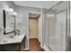 Bathroom features a stall shower, white toilet and vanity sink with a white cabinets at 131 Banyon Ct, Dallas, GA 30157