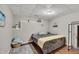 Basement bedroom features hardwood floors, cool gray walls, and beach themed decorations at 131 Banyon Ct, Dallas, GA 30157