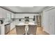 Modern kitchen with a central island, stainless steel appliances, and sleek countertops at 131 Banyon Ct, Dallas, GA 30157