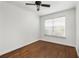 Bedroom with hardwood floors, fresh paint, a ceiling fan, and a large window at 2240 Cheshire Bridge Ne Rd # 206, Atlanta, GA 30324