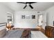 Bright bedroom with hardwood floors, stylish décor, and natural light from a window at 2240 Cheshire Bridge Ne Rd # 206, Atlanta, GA 30324