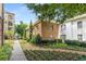 Multi-Gathering building featuring green space and lush landscaping on a sunny day at 2240 Cheshire Bridge Ne Rd # 206, Atlanta, GA 30324