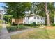 A charming two-story building, featuring manicured landscaping and brick accents for added curb appeal at 2240 Cheshire Bridge Ne Rd # 206, Atlanta, GA 30324