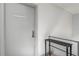 Neutral painted hallway, features a shelf and the door to unit 206 at 2240 Cheshire Bridge Ne Rd # 206, Atlanta, GA 30324