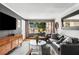 Bright and spacious living room featuring modern furniture and a large window at 2240 Cheshire Bridge Ne Rd # 206, Atlanta, GA 30324