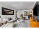 Living room with comfortable seating and a modern design aesthetic at 2240 Cheshire Bridge Ne Rd # 206, Atlanta, GA 30324