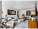 Cozy living room featuring modern furnishings and open access to kitchen at 2240 Cheshire Bridge Ne Rd # 206, Atlanta, GA 30324