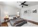 Bedroom featuring hardwood floors, neutral walls, ceiling fan and modern furniture at 2240 Cheshire Bridge Ne Rd # 206, Atlanta, GA 30324