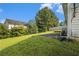 Well-maintained backyard boasts a patio area perfect for outdoor entertaining, surrounded by lush greenery at 2397 Cove Lake Rd, Lithonia, GA 30058