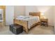 This bedroom features a modern platform bed, side table, and neutral decor at 2397 Cove Lake Rd, Lithonia, GA 30058