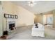 Comfortable living room with a fireplace and natural light from an open doorway at 2397 Cove Lake Rd, Lithonia, GA 30058