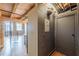 Hallway featuring hardwood floors, a door, and view of spiral staircase to another level at 63 Mangum Sw St # 3, Atlanta, GA 30313