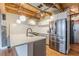Modern kitchen features stainless steel appliances, hardwood floors, and an island sink at 63 Mangum Sw St # 3, Atlanta, GA 30313