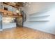 Living room features hardwood floors, spiral staircase, and exposed wood beams at 63 Mangum Sw St # 3, Atlanta, GA 30313