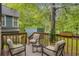 Serene backyard patio featuring comfortable seating, lush greenery, and a tranquil setting at 2419 Anderson Mill Rd, Austell, GA 30106