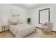 Bright bedroom with cozy decor, soft lighting, and a tranquil atmosphere at 2419 Anderson Mill Rd, Austell, GA 30106