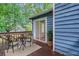 Inviting patio with seating, plants, and sliding glass doors to the home's interior at 2419 Anderson Mill Rd, Austell, GA 30106