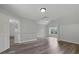 Spacious bedroom with hardwood floors, neutral walls and plenty of natural light at 3520 Mystic Dr, Buford, GA 30519