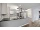 Modern kitchen with stainless steel appliances, white cabinets, and a spacious island at 3520 Mystic Dr, Buford, GA 30519