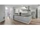 Open kitchen with stainless steel appliances, white cabinets, and a large island for meal prep at 3520 Mystic Dr, Buford, GA 30519