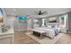 Spacious main bedroom boasts wood floors, ceiling fan, and neutral tones at 3520 Mystic Dr, Buford, GA 30519