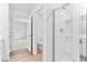 Bathroom features a modern walk-in shower and is open to the bedroom at 3660 Cattle Field Xing, Loganville, GA 30052