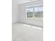 Bright bedroom features a large window, providing ample natural light at 3660 Cattle Field Xing, Loganville, GA 30052