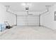 Spacious two car garage with concrete floor at 3660 Cattle Field Xing, Loganville, GA 30052