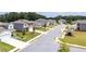 Street view capturing the home and neighborhood, showcasing curb appeal and community setting at 3660 Cattle Field Xing, Loganville, GA 30052