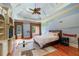 Bedroom features hardwood floors and windows with natural light at 720 Heards Ferry Rd, Sandy Springs, GA 30328