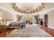 Bedroom has recessed ceiling and fireplace at 720 Heards Ferry Rd, Sandy Springs, GA 30328