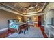 Bedroom with recessed ceiling and ceiling fan at 720 Heards Ferry Rd, Sandy Springs, GA 30328