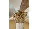 Close-up of an ornate column with decorative carvings at 720 Heards Ferry Rd, Sandy Springs, GA 30328