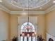 Foyer features a grand chandelier and architectural details at 720 Heards Ferry Rd, Sandy Springs, GA 30328