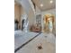 Grand foyer features a curved staircase, marble floors, and decorative lighting creating a striking entrance at 720 Heards Ferry Rd, Sandy Springs, GA 30328