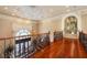 The foyer has hardwood floors and decorative lighting at 720 Heards Ferry Rd, Sandy Springs, GA 30328