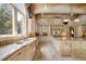 Gourmet kitchen featuring granite countertops, custom cabinetry, and top-of-the-line appliances for cooking experience at 720 Heards Ferry Rd, Sandy Springs, GA 30328